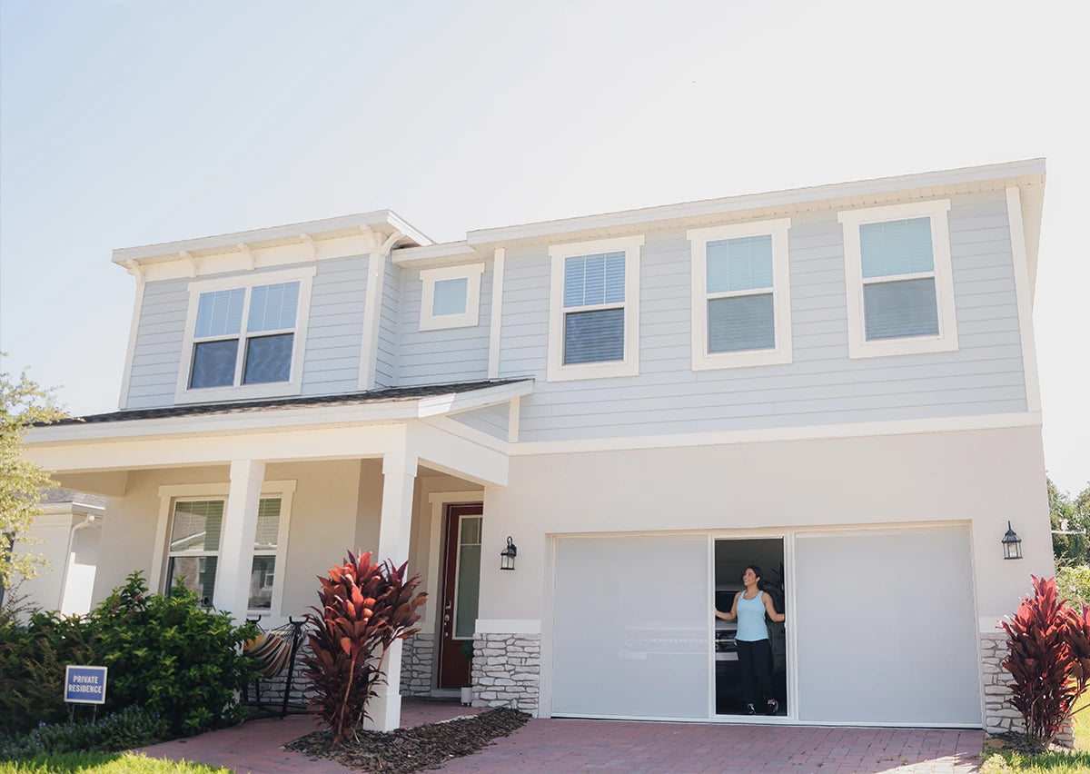 Garage door screen installed on a residential home in Central Florida